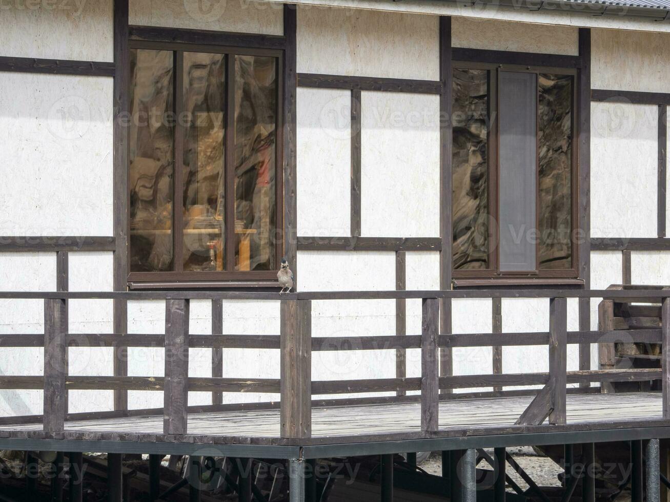Wood window in spring sun, window texture and reflection in it. photo