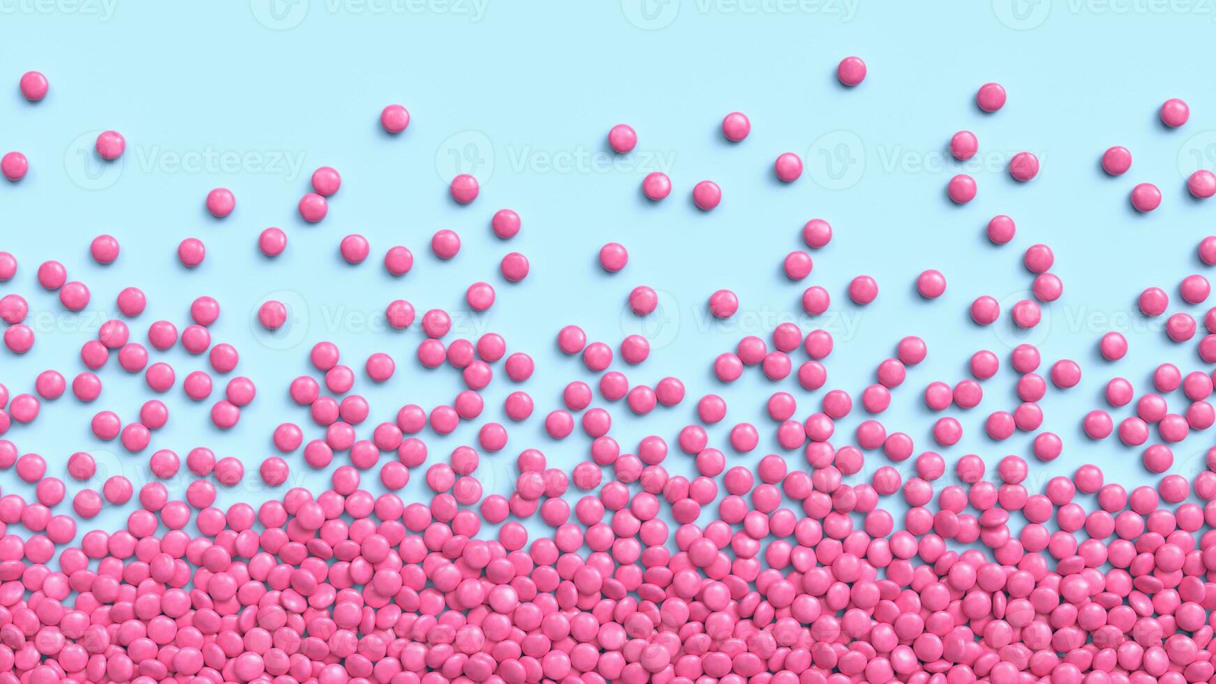 Pink coated chocolate candies scattered on blue background. 3d rendering photo