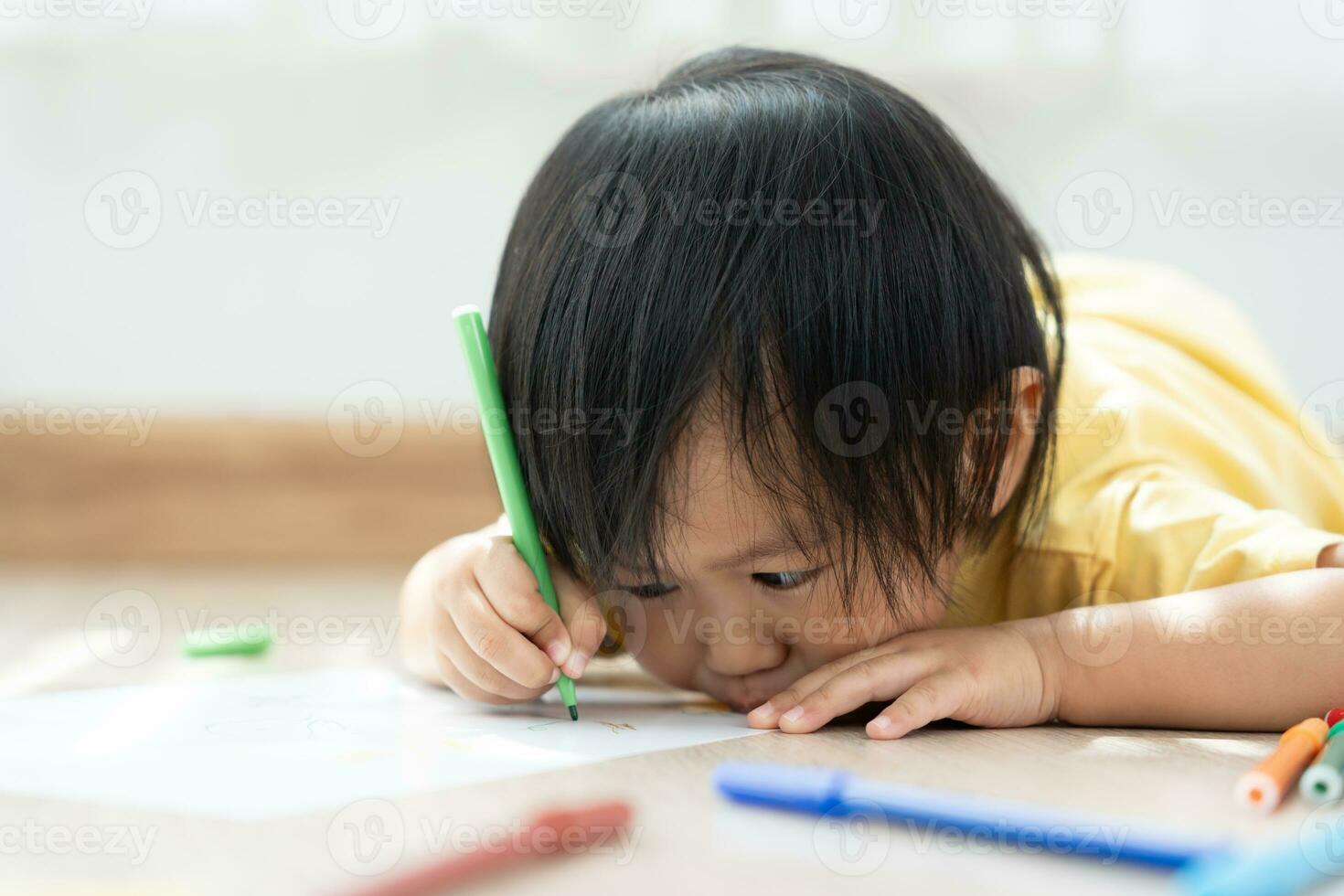 Happy Asia children playing learning paint on paper. Activity, development, IQ, EQ, meditation, brain, muscles, essential skills, family having fun spending time together. Holiday photo