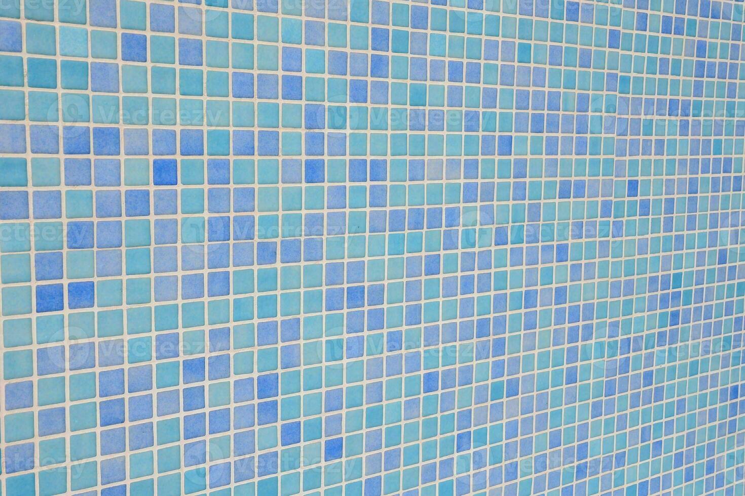 a blue and white tiled wall photo