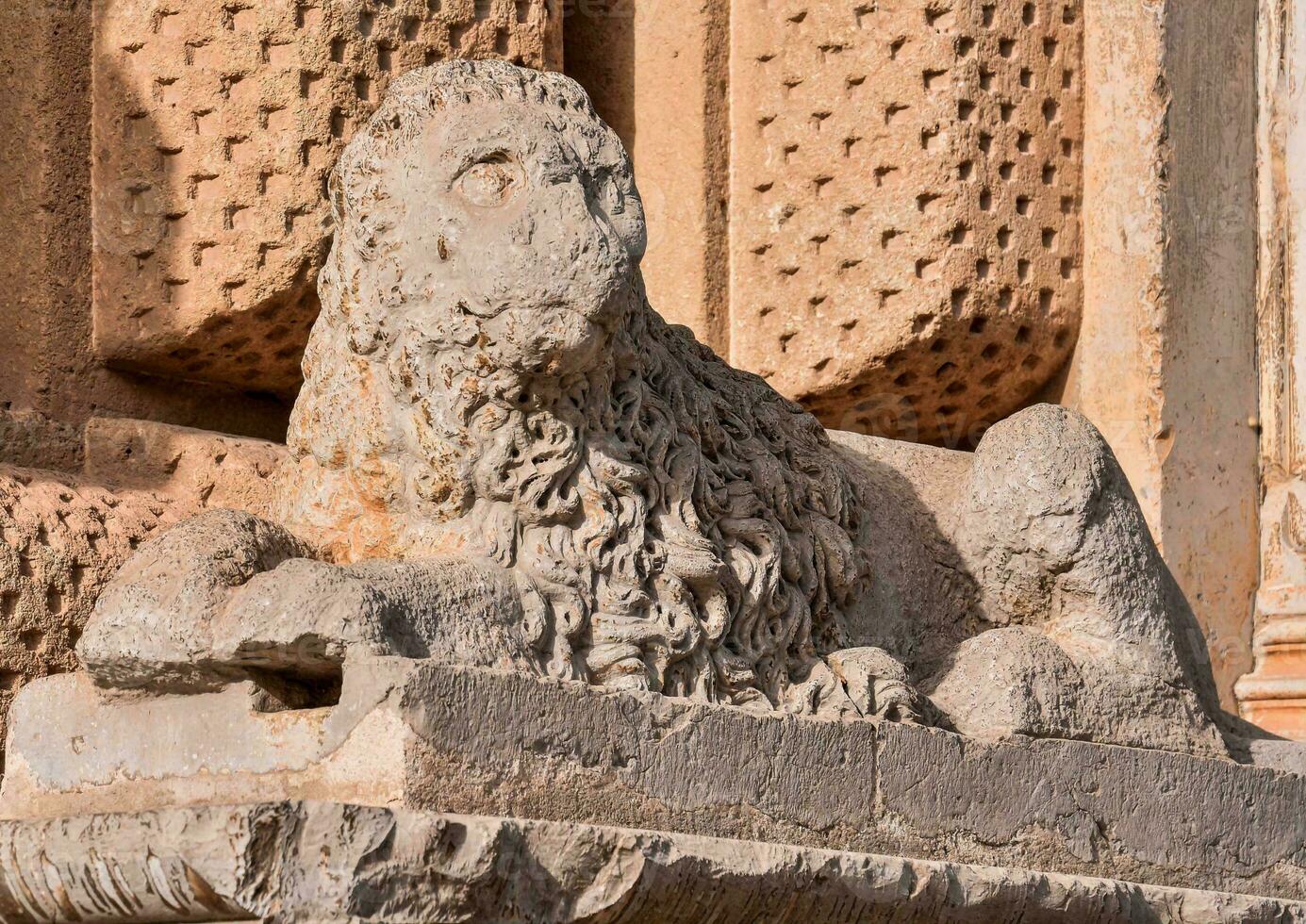 Detail of a lion sculpture photo