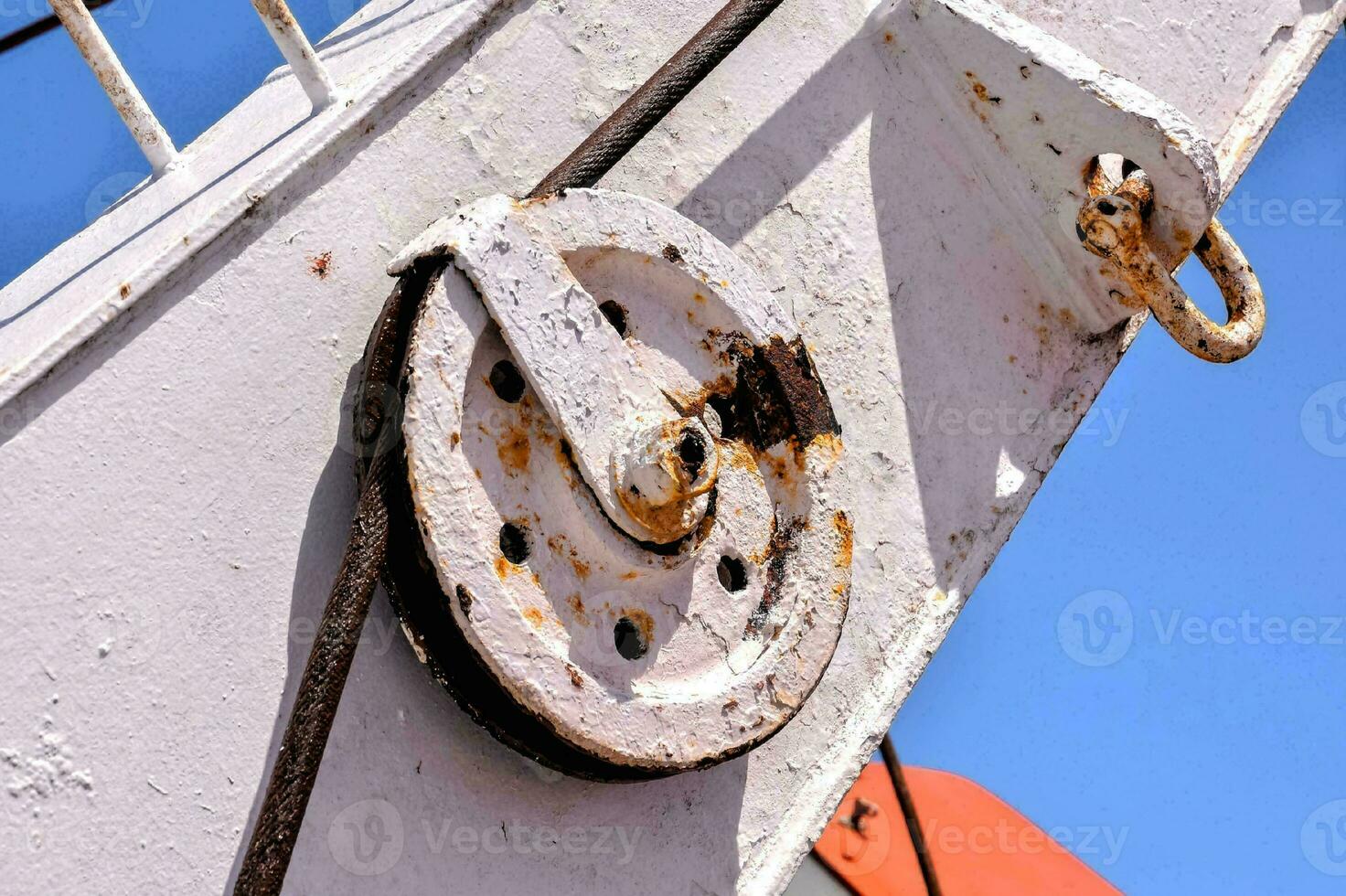 Rusty metal pulley photo