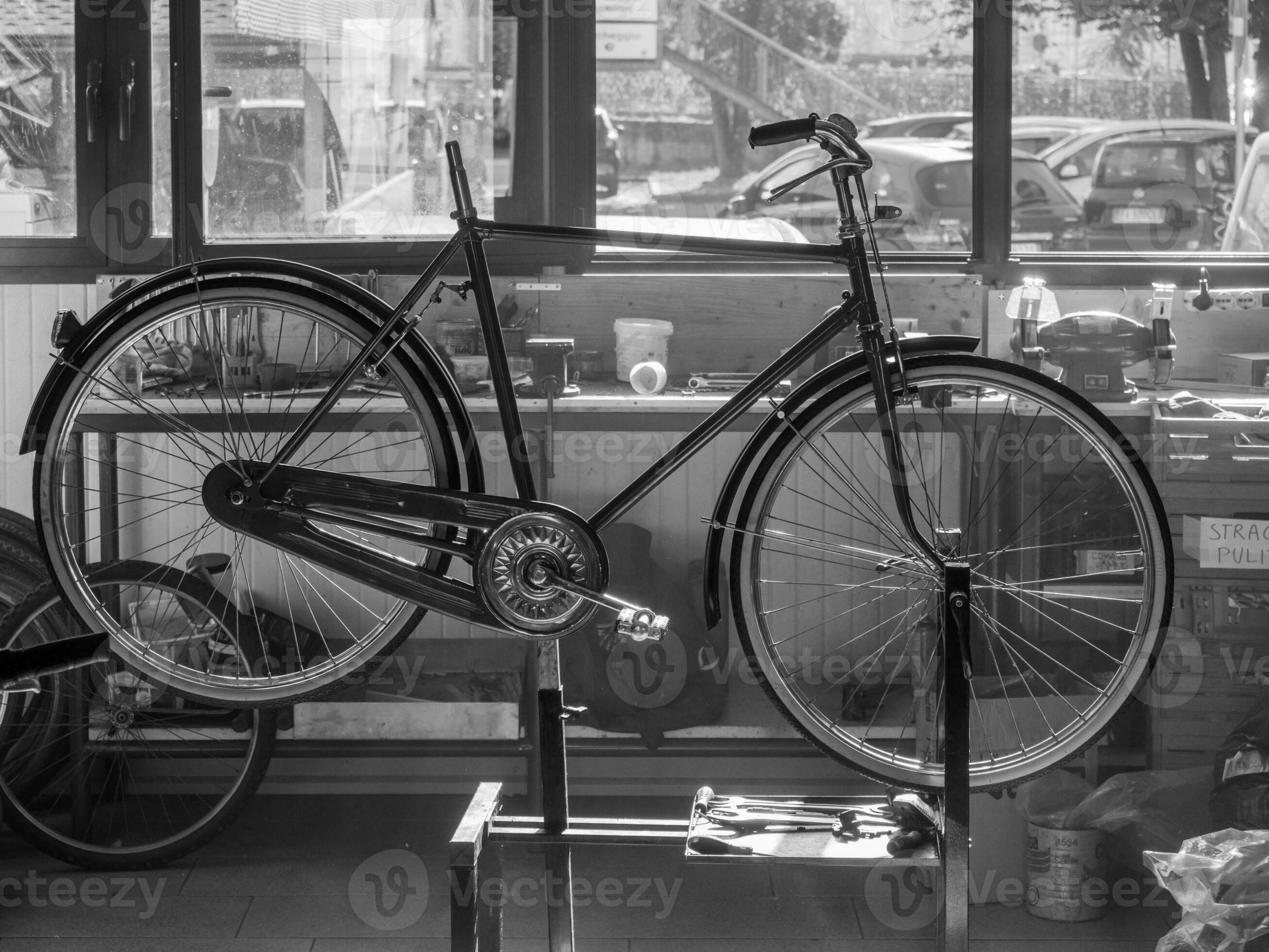 at the bike shop store and repair , mechanic expert repairs restore and