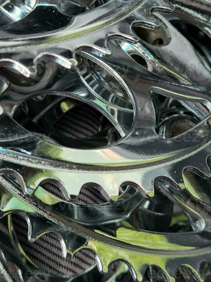 Bicycle sprockets. Background made of steel bicycle sprockets. Bike parts photo
