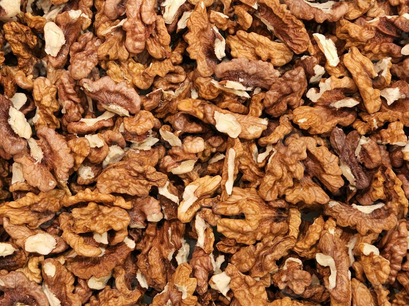 Walnuts. Walnut kernels. Background of ripe walnut kernels photo