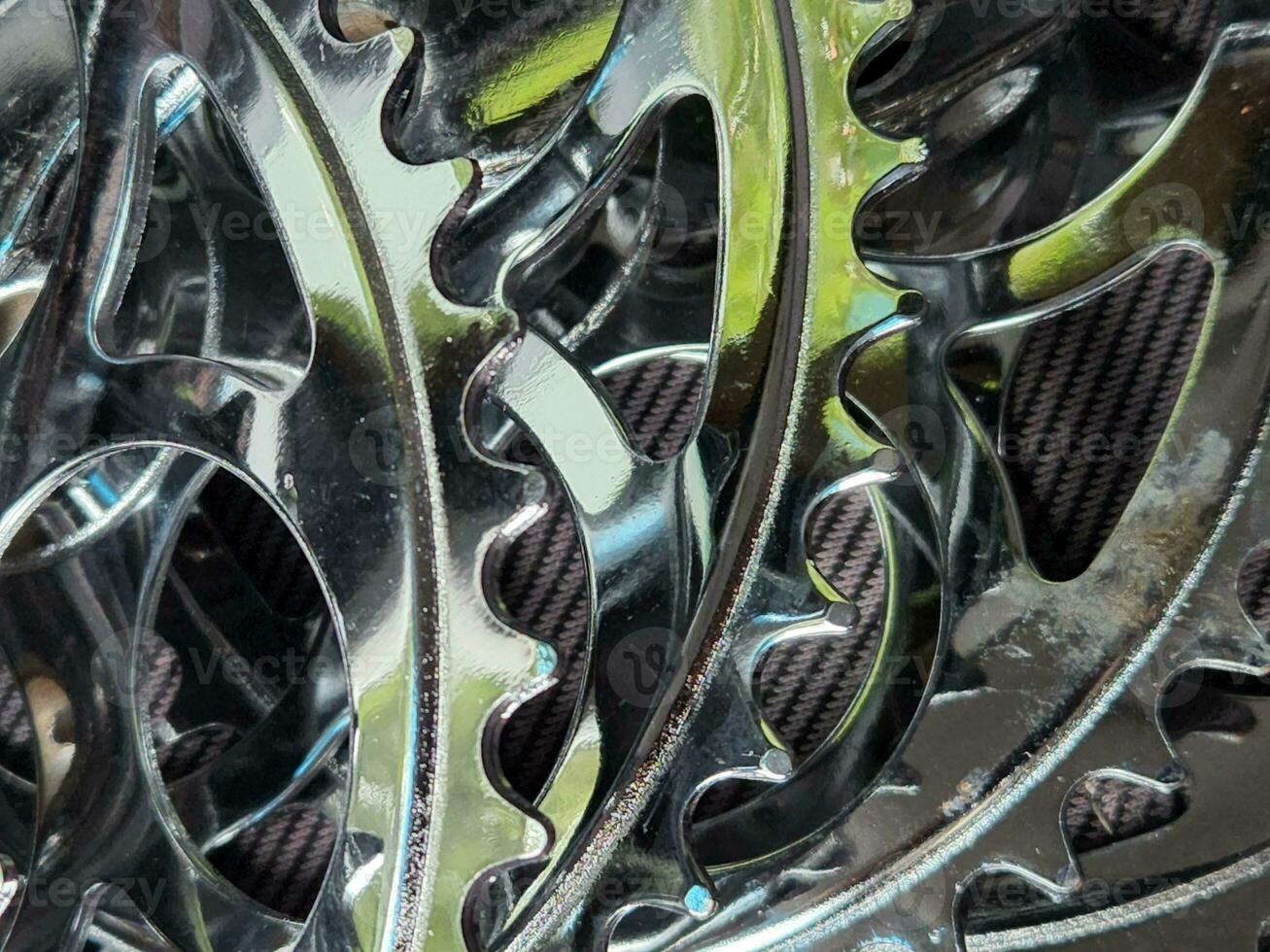 Bicycle sprockets. Background made of steel bicycle sprockets. Bike parts photo