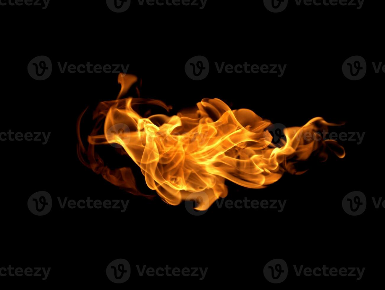 Fire flames on a black background photo