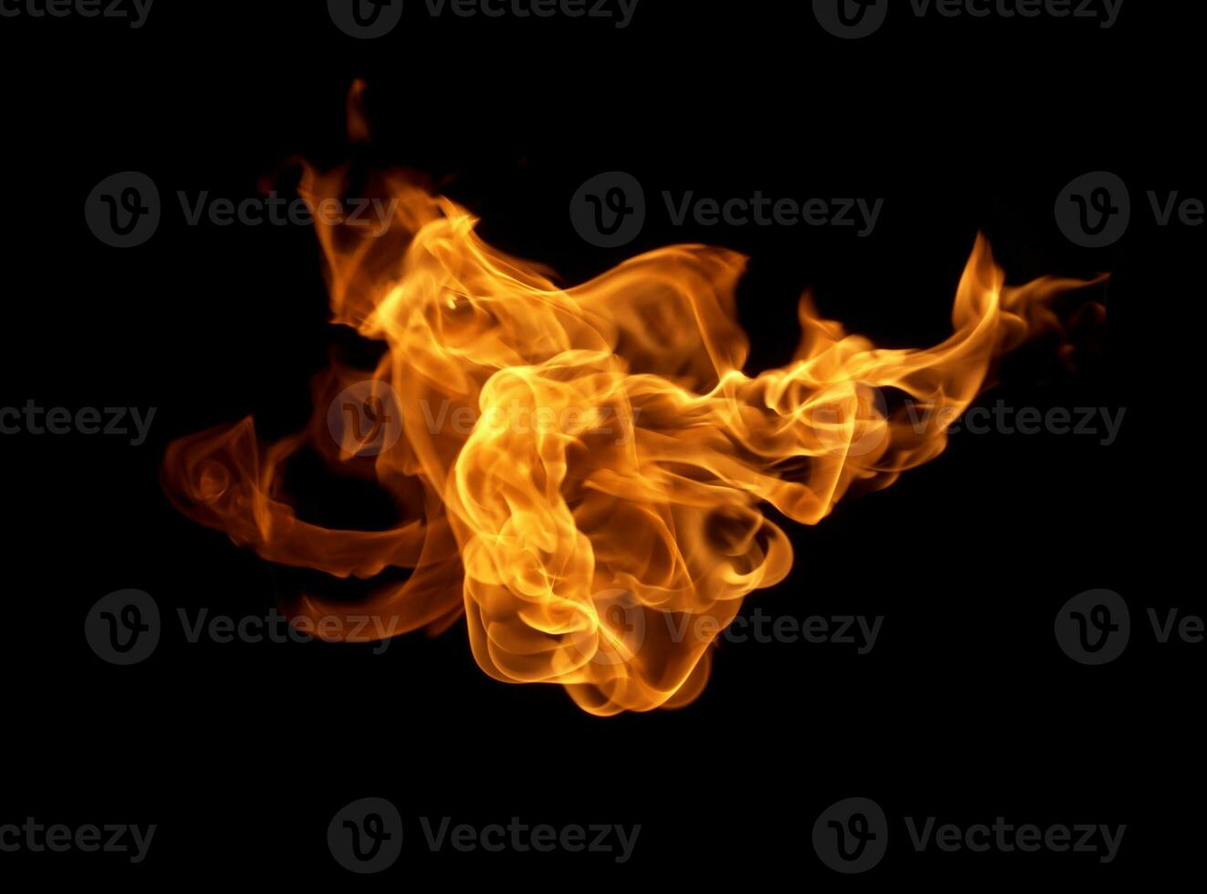 Fire flames on a black background photo