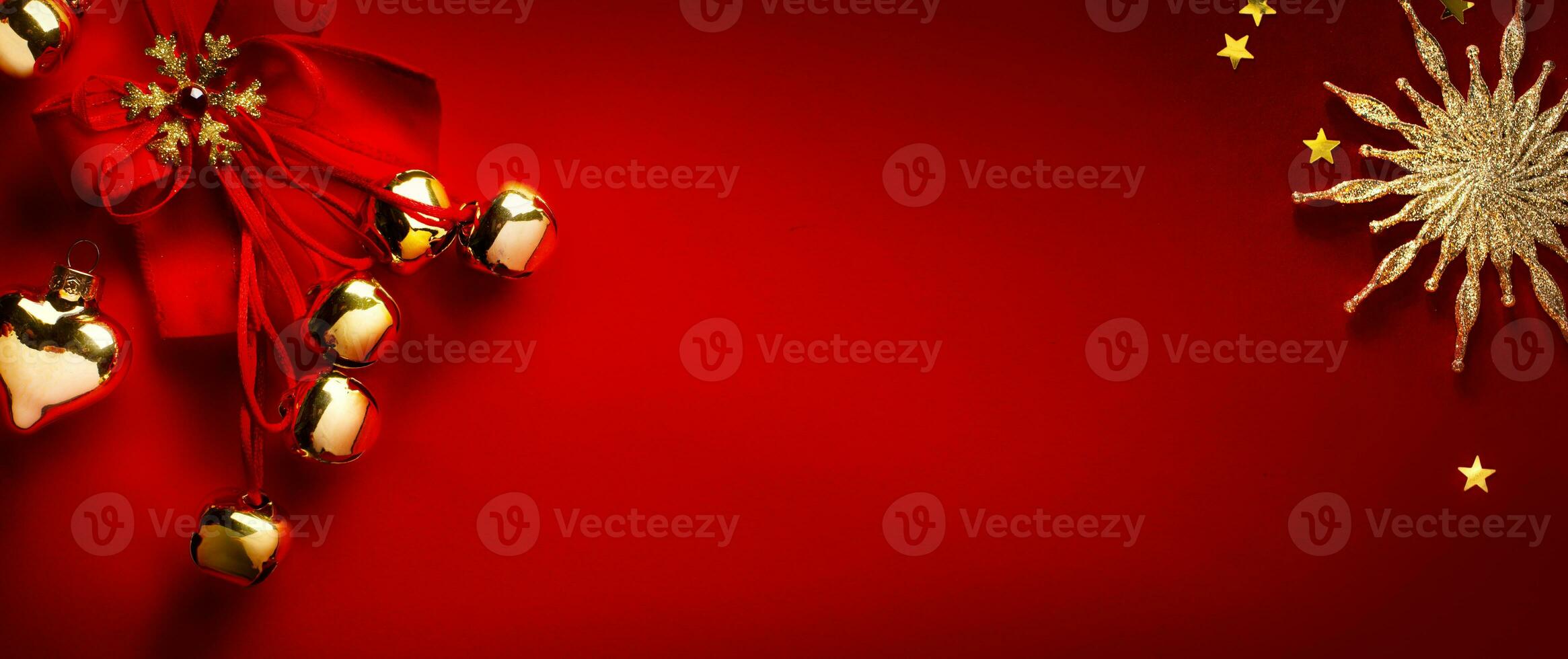 Christmas greeting card or holidays banner design, Golden Christmas tree decoration on red background, Copy space photo