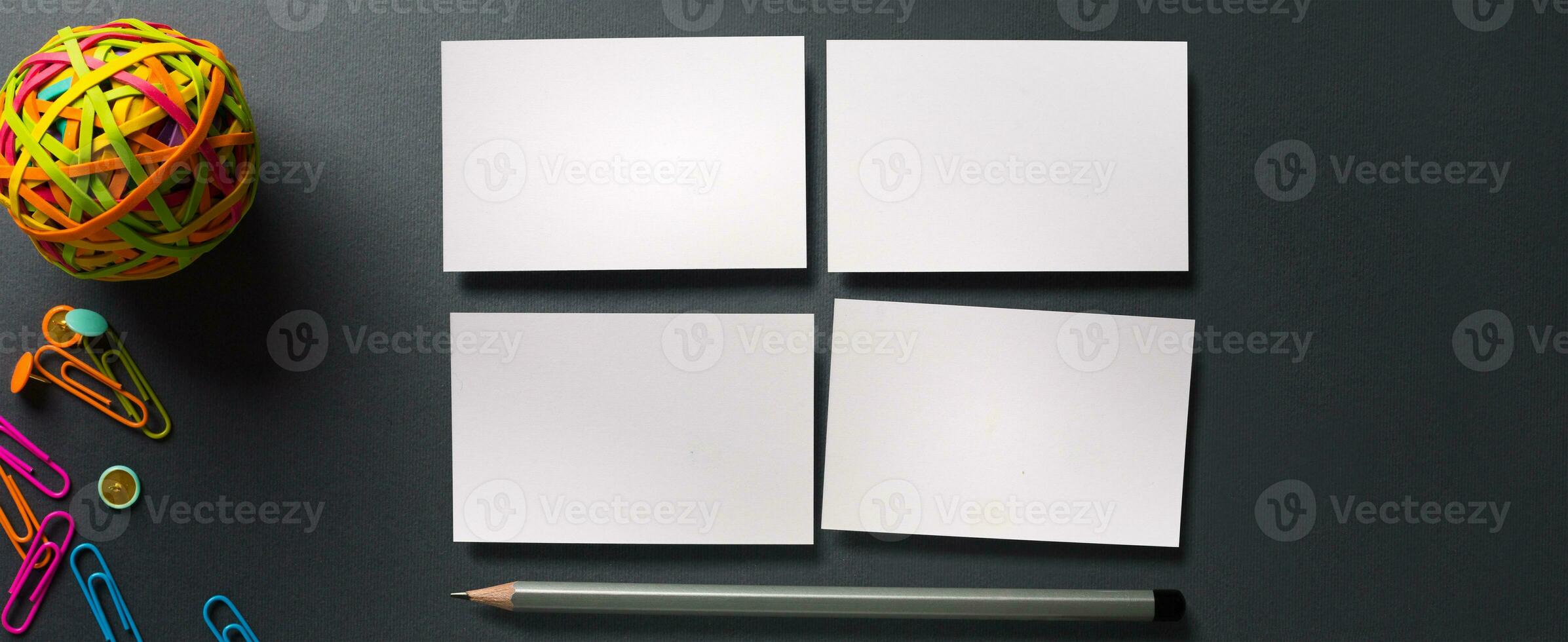 Flat lay with office stationery and business card on gray background, top view. design for visualization corporate identity photo