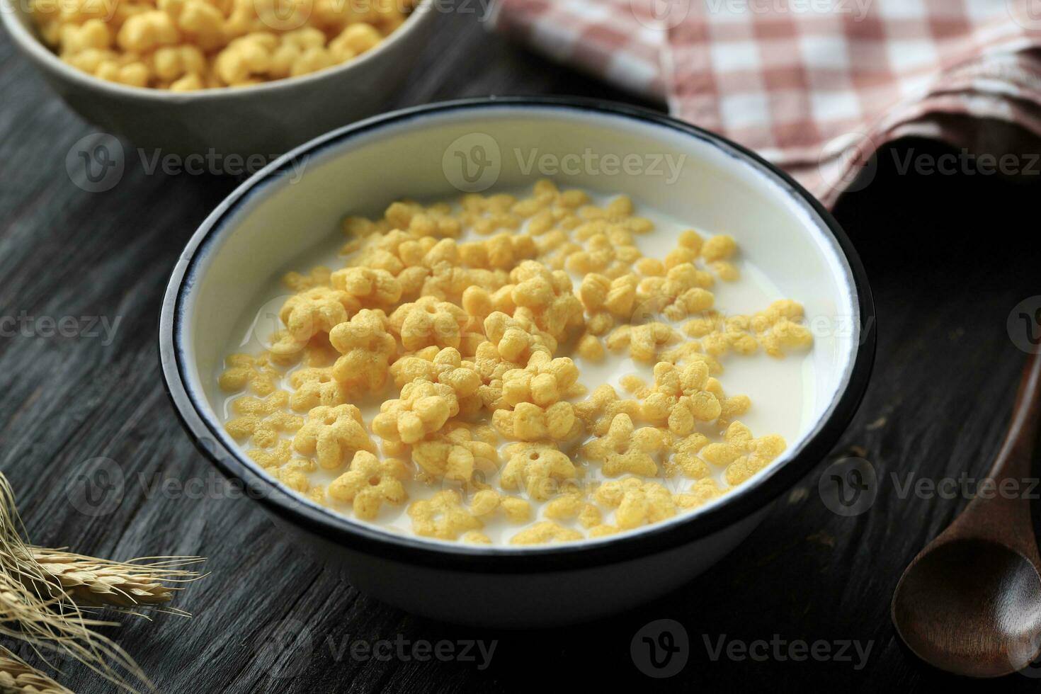 A Bowl of Star Shaped Cereal Honey Star with Fresh Milk photo