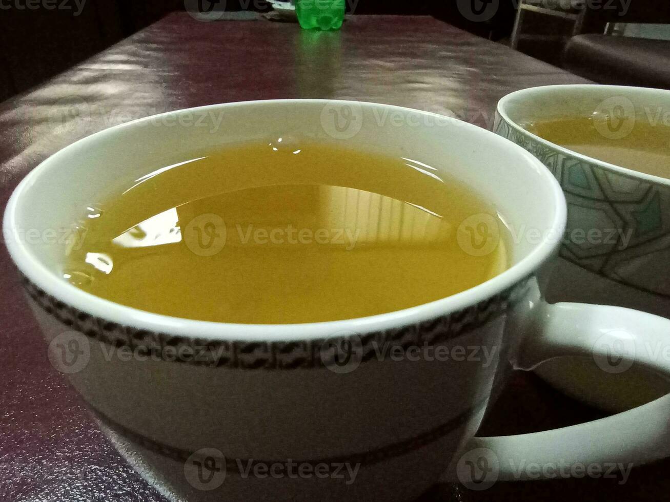Cup of tea on a table in a cafe, close-up photo