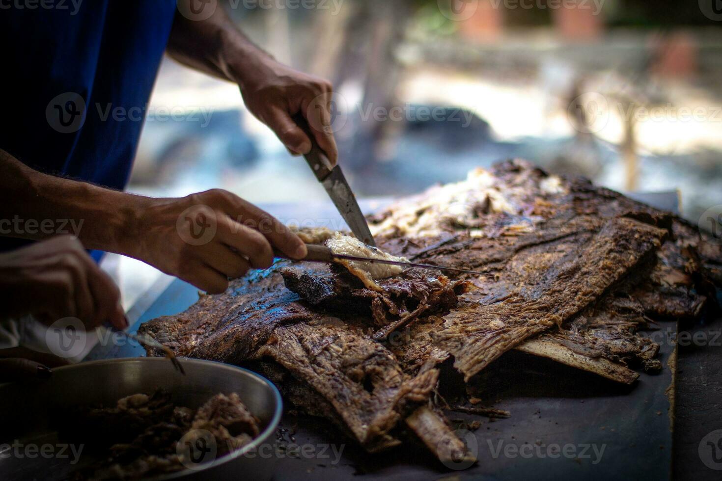 Grilled lamb ribs with knife on the street market in Thailand. photo
