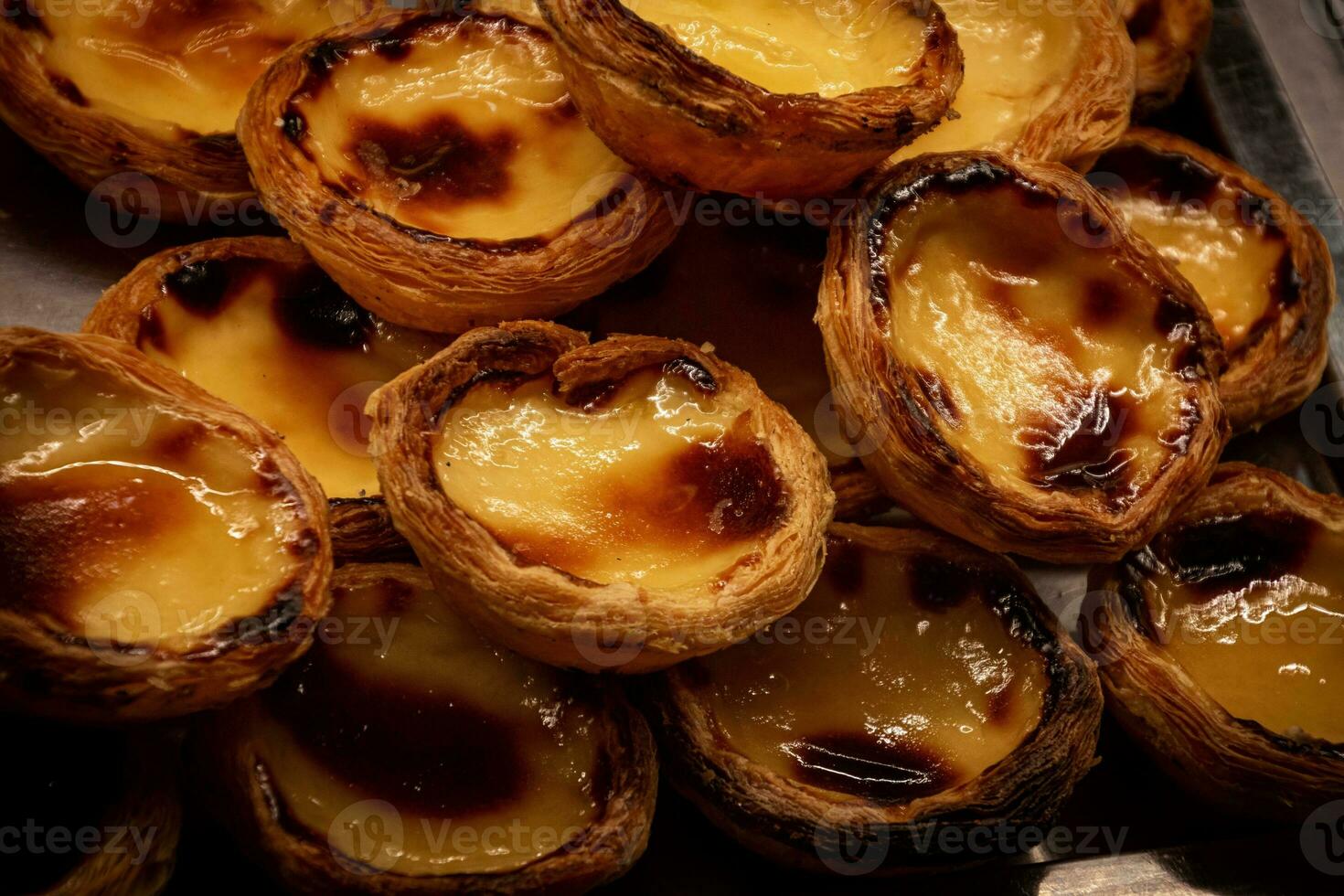 Pastel de nata, traditional portuguese egg tart. photo