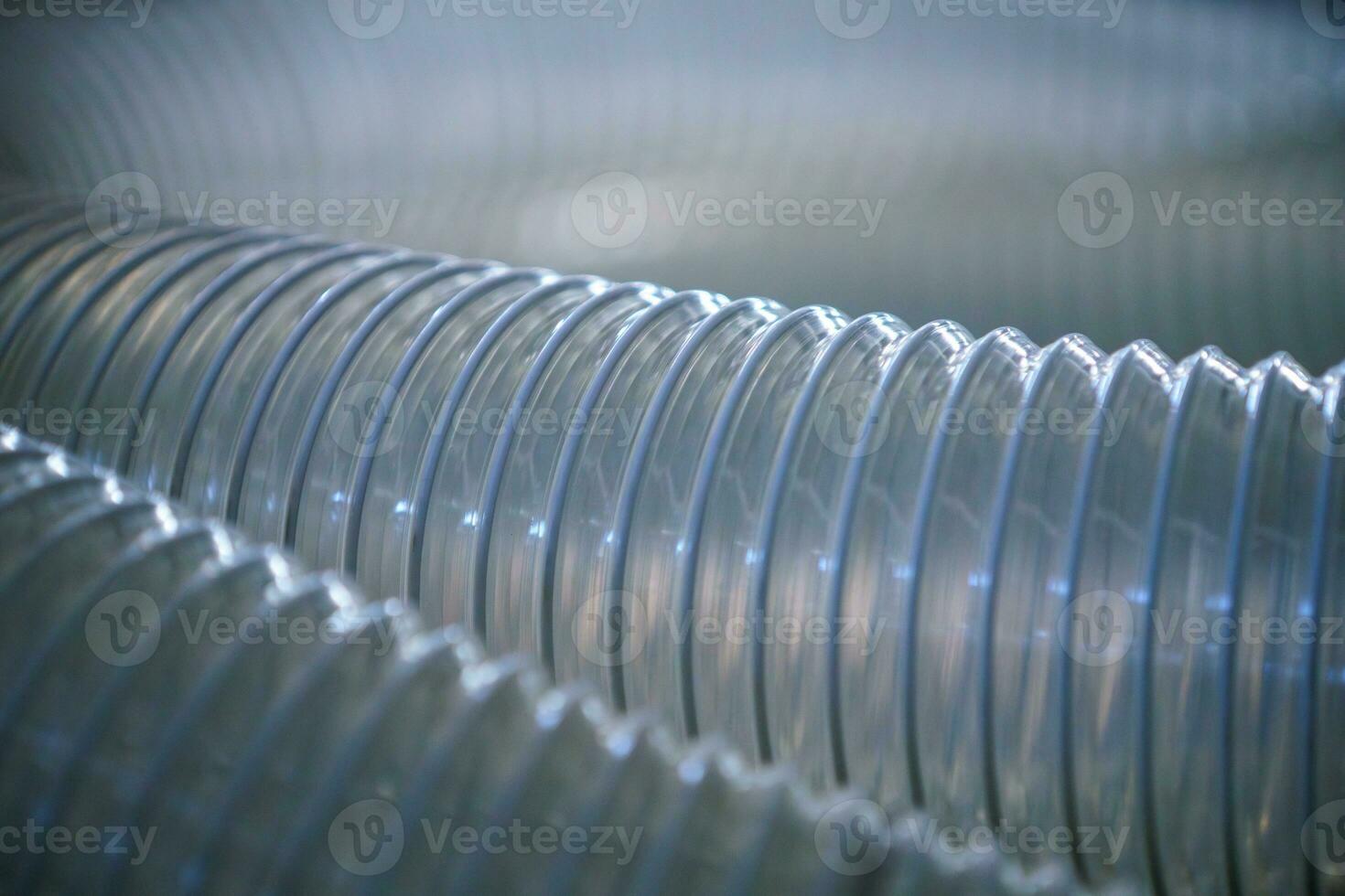 Flexible PUR antistatic suction hose for air conditioning, background flexi hose, industrial ventilation. photo
