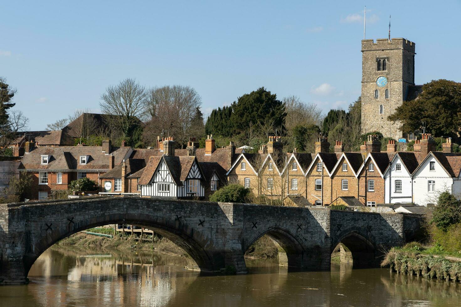 AYLESFORD, KENT, UK - MARCH 24. View of the 14th century bridge and St Peter's church at Aylesford on March 24, 2019 photo