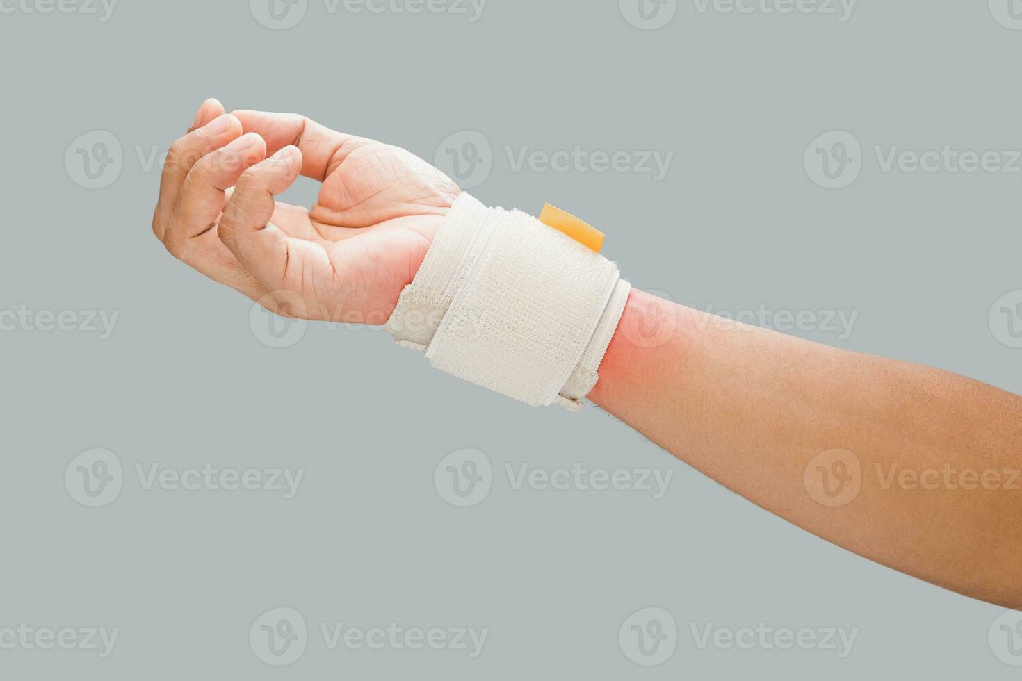 The man wears a wrist support. to alleviate wrist pain. photo