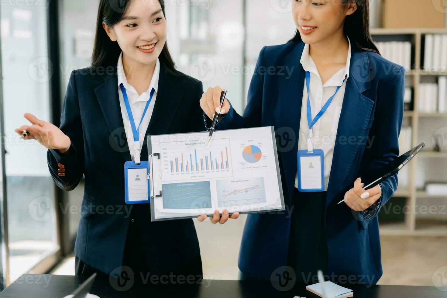 Business team discuss at meeting room. working together with laptop ,tablet and smart phone on desk Financial accountant , planner , meeting , introduction concept. photo