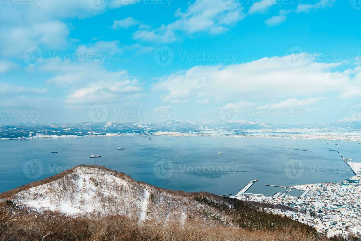 Beautiful landscape and cityscape from Hakodate Mountain with Snow in winter season. landmark and popular for attractions in Hokkaido, Japan.Travel and Vacation concept photo