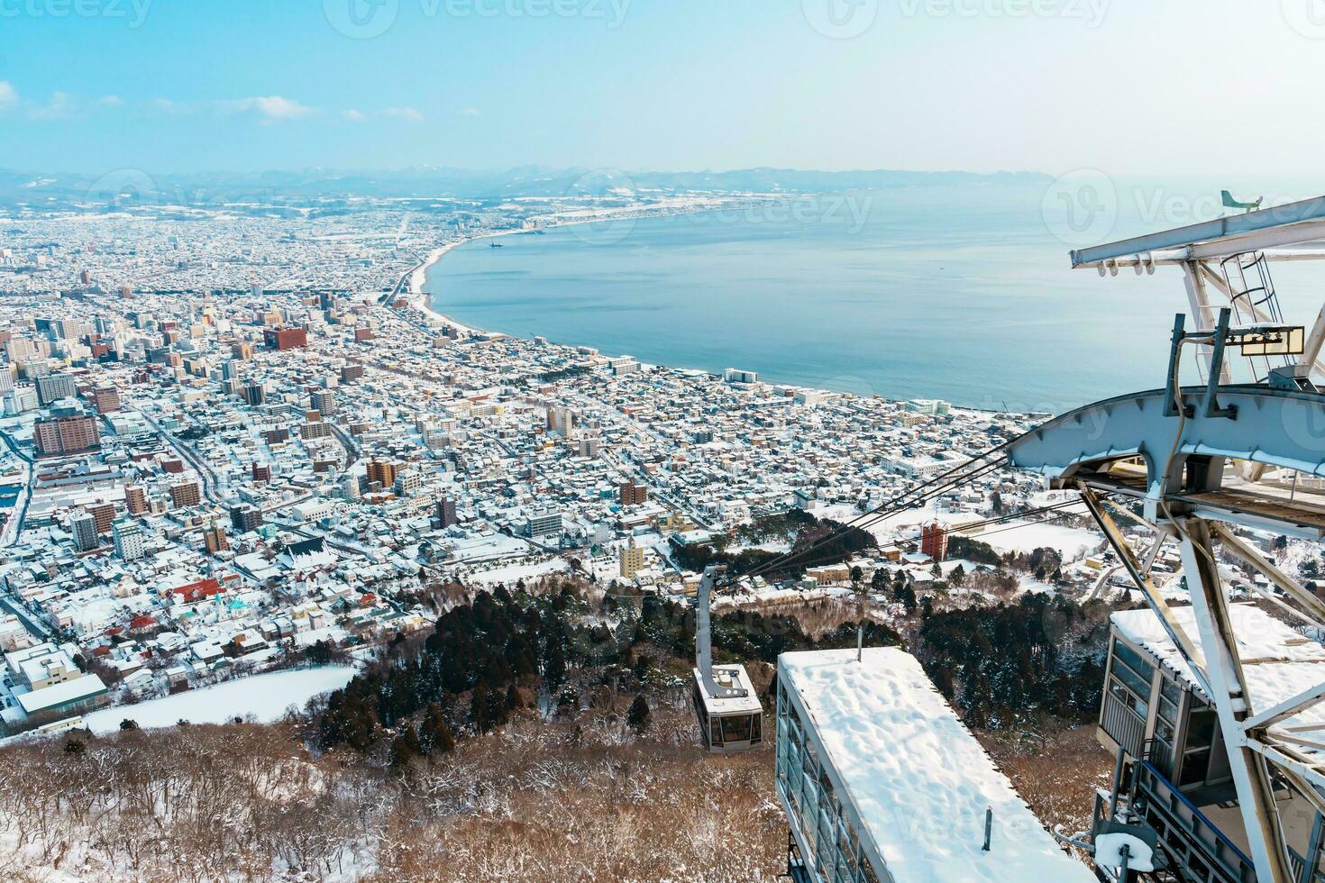 Beautiful landscape and cityscape from Hakodate Mountain with Snow in winter season. landmark and popular for attractions in Hokkaido, Japan.Travel and Vacation concept photo