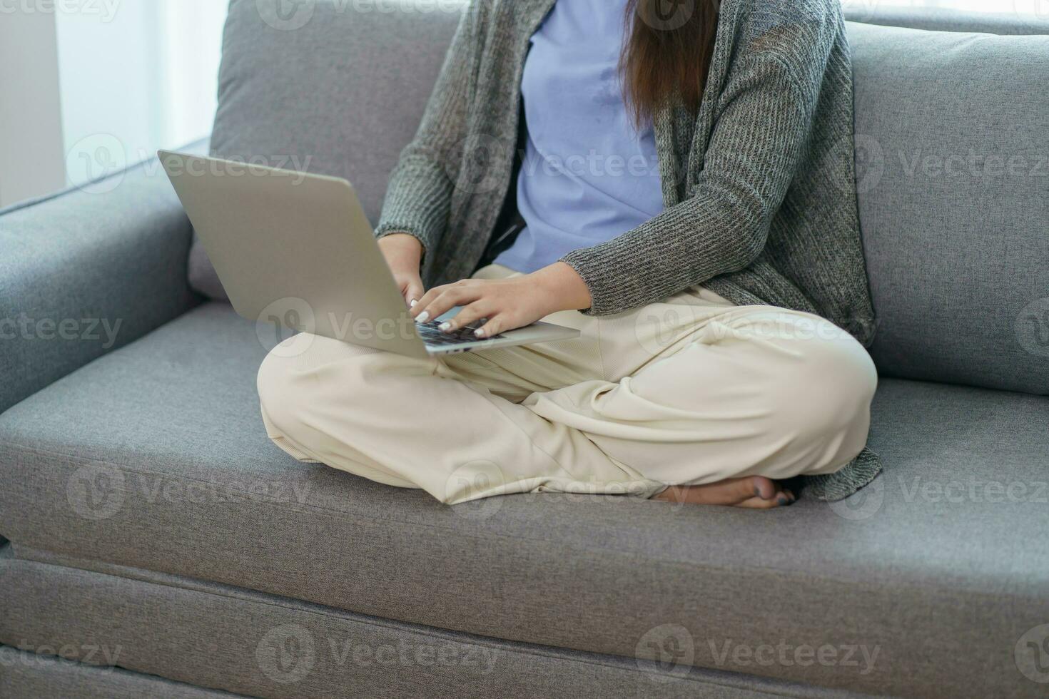 Happy beautiful Asian Woman. Business woman working from home with laptop Financial Home work space concept. photo