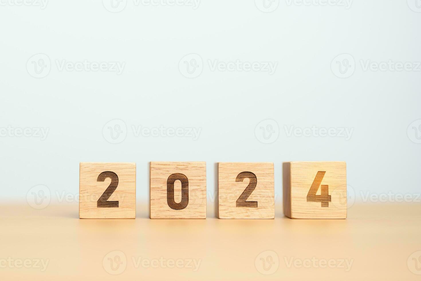 2024 year block on table. goal, Resolution, strategy, plan, start, budget, mission, action, motivation and New Year concepts photo
