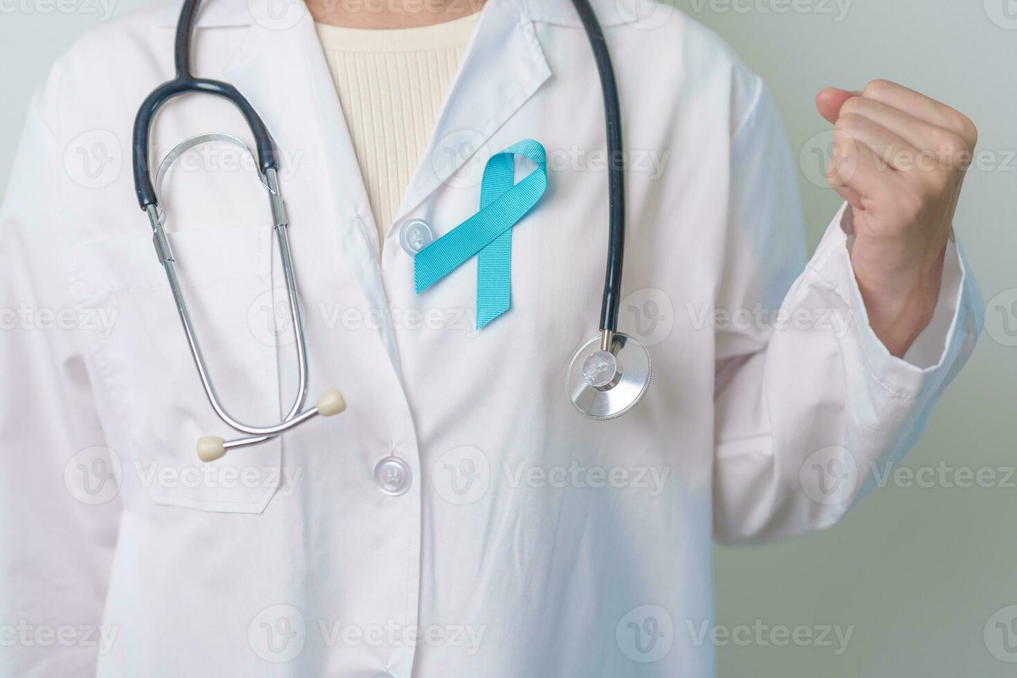 Blue November Prostate Cancer Awareness month, Doctor with Blue Ribbon in hospital for support people life and illness. Healthcare, International men, Father, Diabetes and World cancer day photo