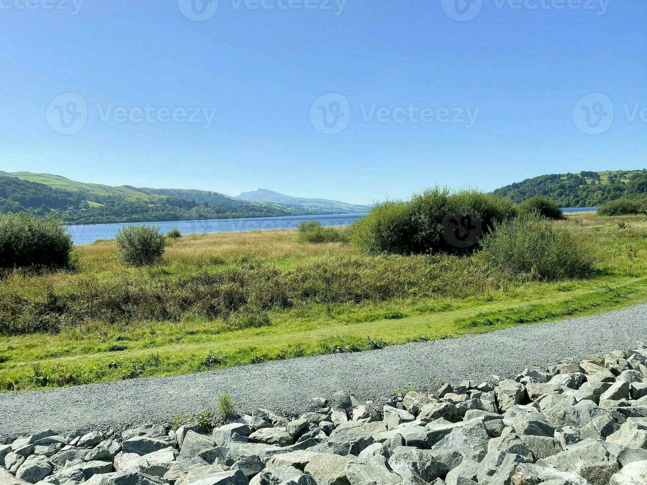 A view of the North Wales countryside at Bala Lake on a sunny day photo