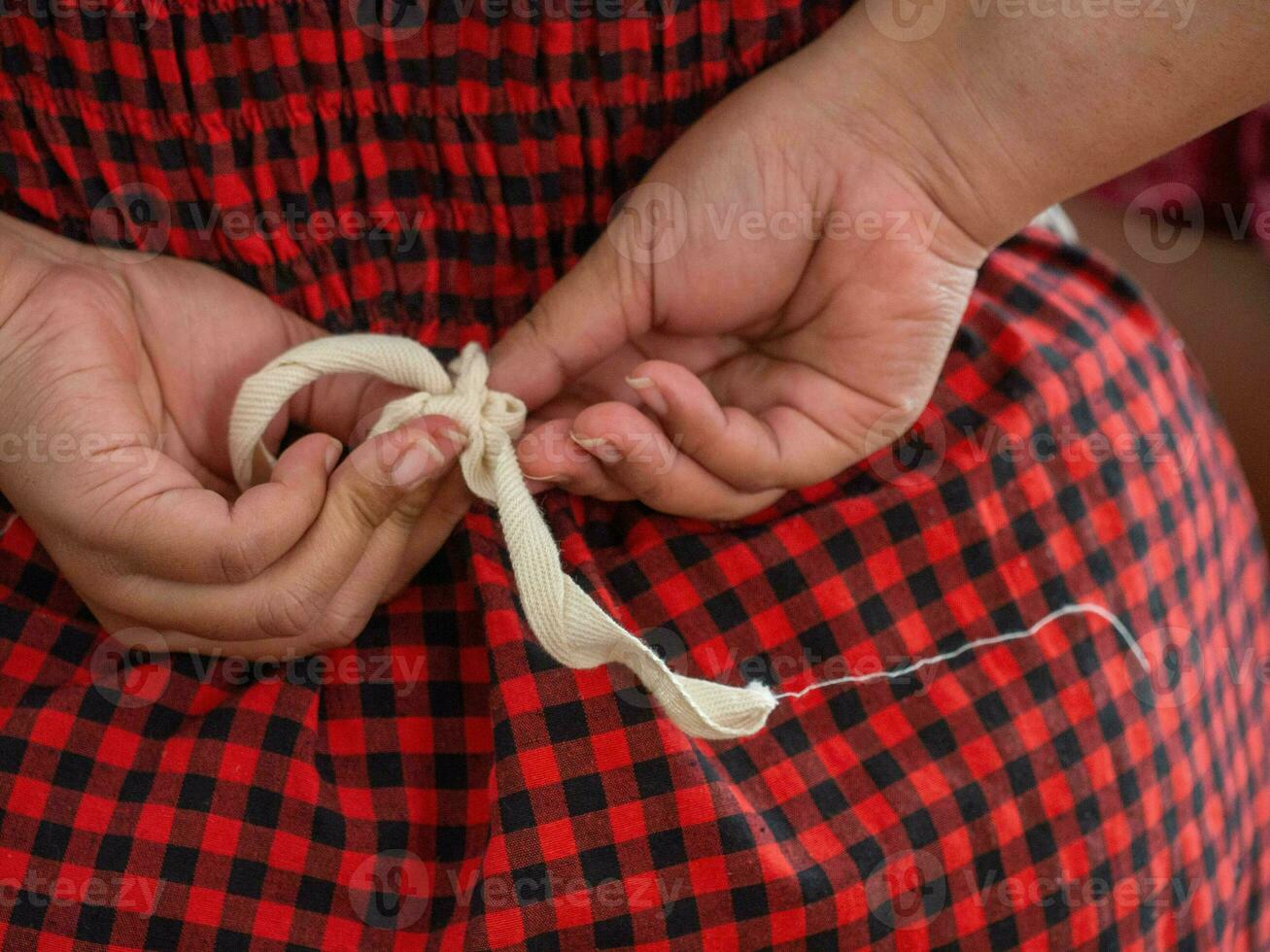 tie a rope border brown cable connection cord curve element equipment decoration design fastening fiber hemp idea line knot lasso pattern rope string symbol shirt woman lady backside copy space twine photo