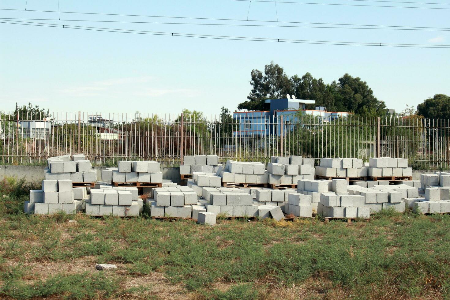 a fence behind the building photo