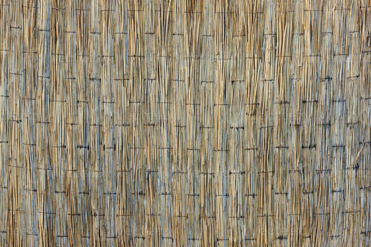 full-frame background and texture of straw mat photo
