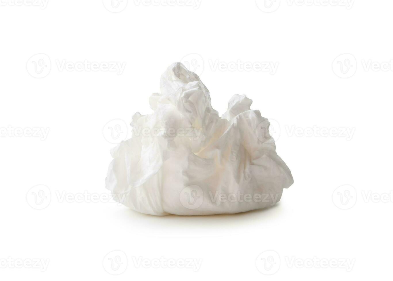 Single screwed or crumpled tissue paper or napkin in strange shape after use in toilet or restroom isolated on white background with clipping path photo