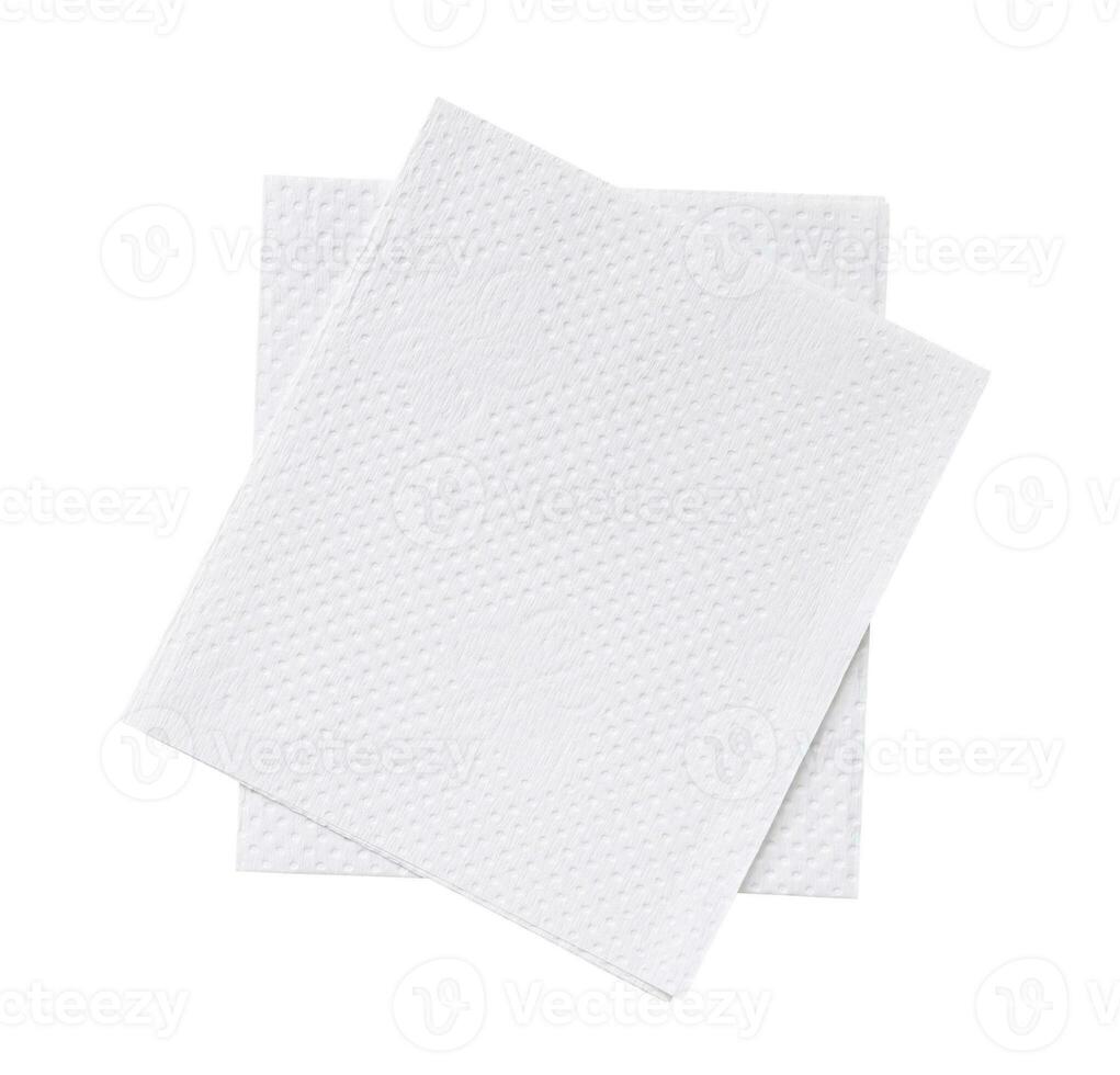 Two folded pieces of white tissue paper or napkin in stack tidily prepared for use in toilet or restroom isolated on white background with clipping path photo