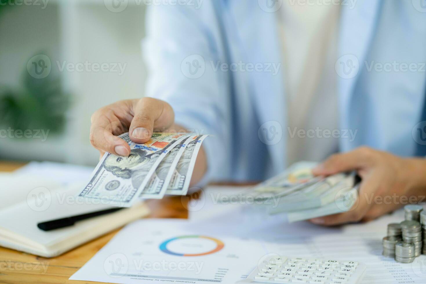 Saving money. Businessman Accountant verify growing business and saving money stacking coins with calculator. Accountancy Concept. photo