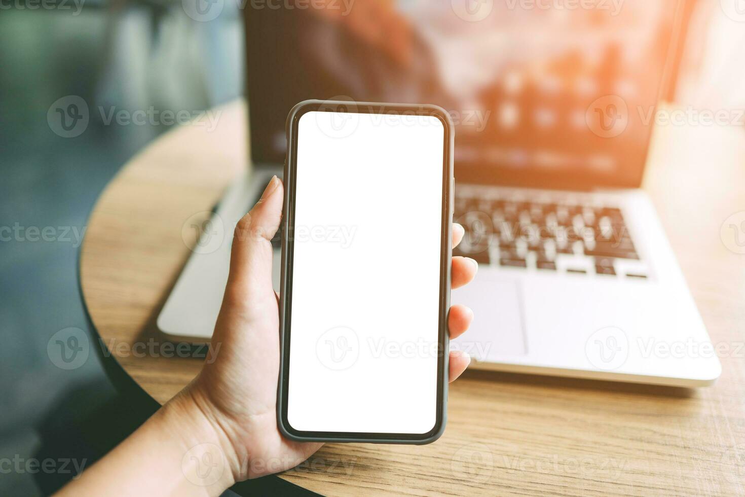 Women's hands holding cell telephone blank copy space screen. smartphone with blank white screen isolated on white background . smart phone with technology concept photo