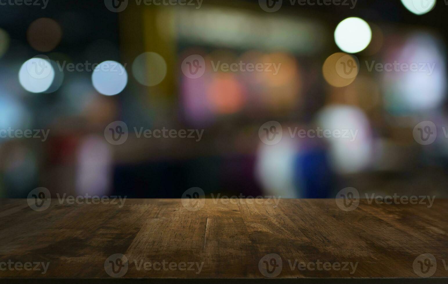 Empty wood table top and blur of out door garden background Empty wooden table space for text marketing promotion. blank wood table copy space for background photo