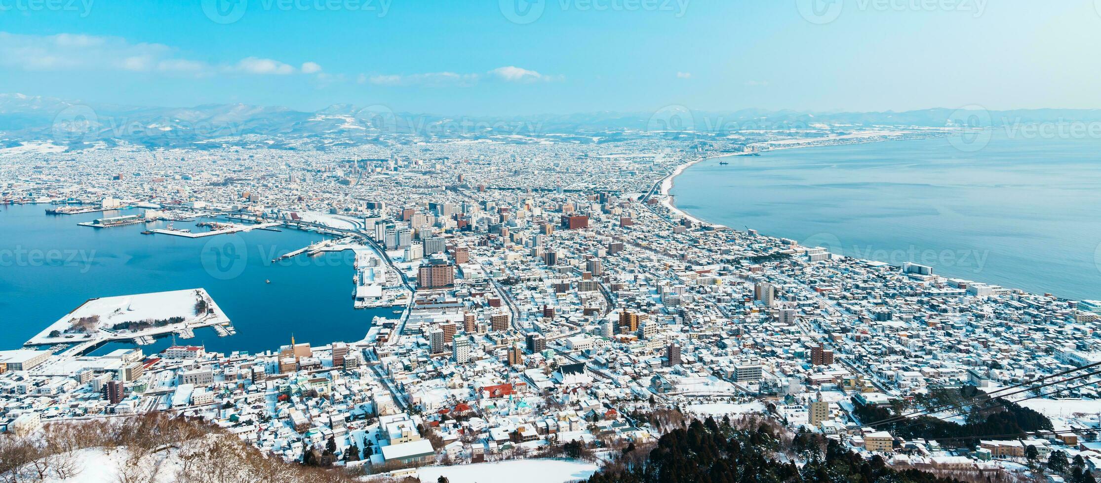 Beautiful landscape and cityscape from Hakodate Mountain with Snow in winter season. landmark and popular for attractions in Hokkaido, Japan.Travel and Vacation concept photo
