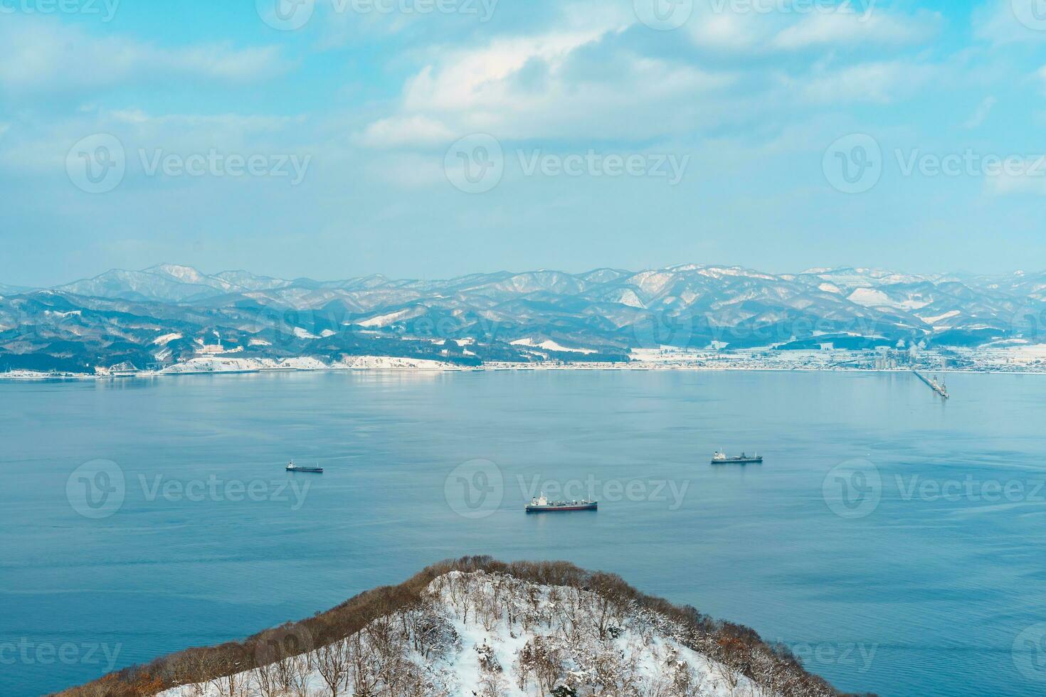 Beautiful landscape and cityscape from Hakodate Mountain with Snow in winter season. landmark and popular for attractions in Hokkaido, Japan.Travel and Vacation concept photo