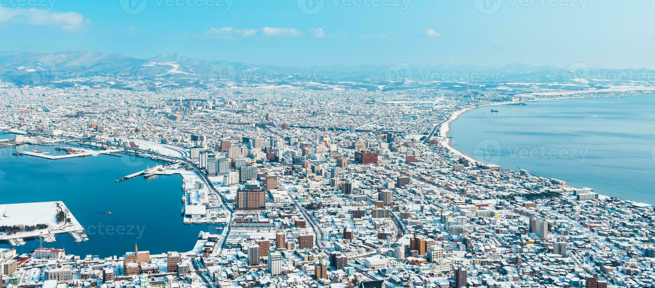 Beautiful landscape and cityscape from Hakodate Mountain with Snow in winter season. landmark and popular for attractions in Hokkaido, Japan.Travel and Vacation concept photo
