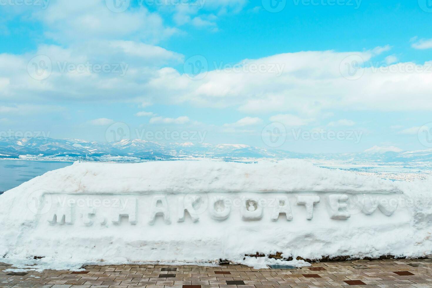 Beautiful landscape and cityscape from Hakodate Mountain with Snow in winter season. landmark and popular for attractions in Hokkaido, Japan.Travel and Vacation concept photo