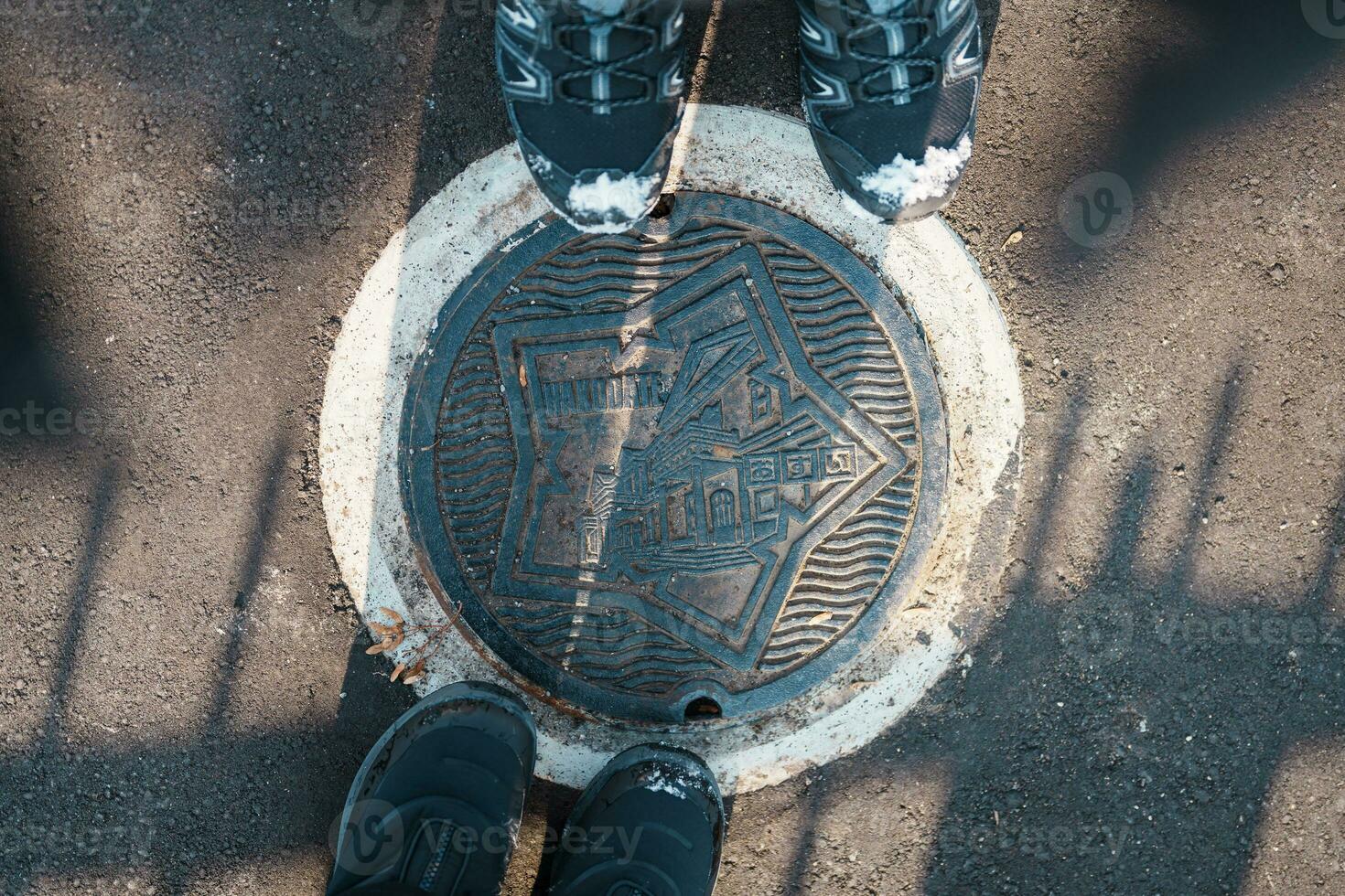 Hakodate city manhole cover with snow in winter season. Hakodate in one of landmark and popular for tourists attractions in Hokkaido, Japan. Travel and Vacation concept photo