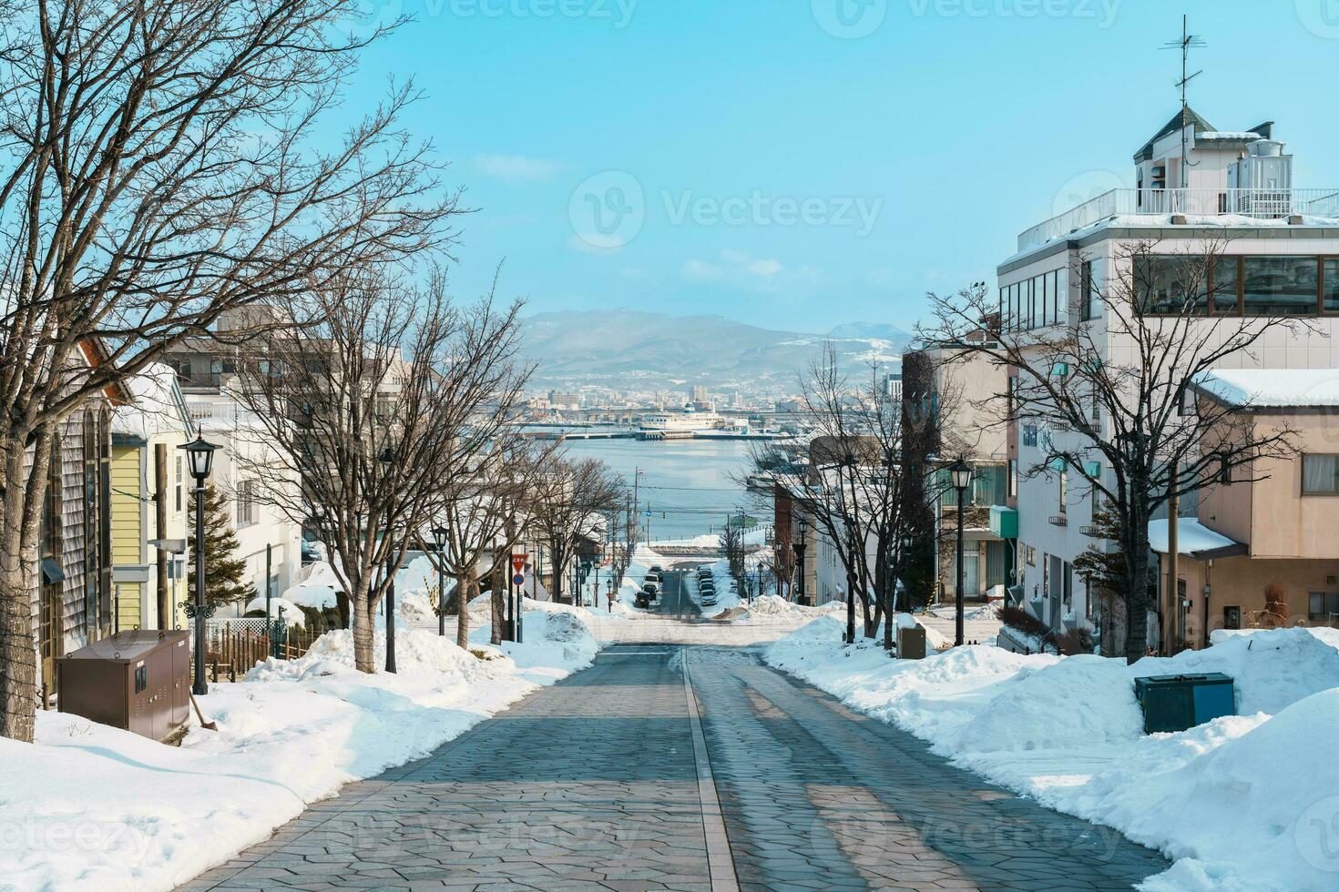 Hachiman Zaka Slope with Snow in winter season. landmark and popular for attractions in Hokkaido, Japan. Travel and Vacation concept photo