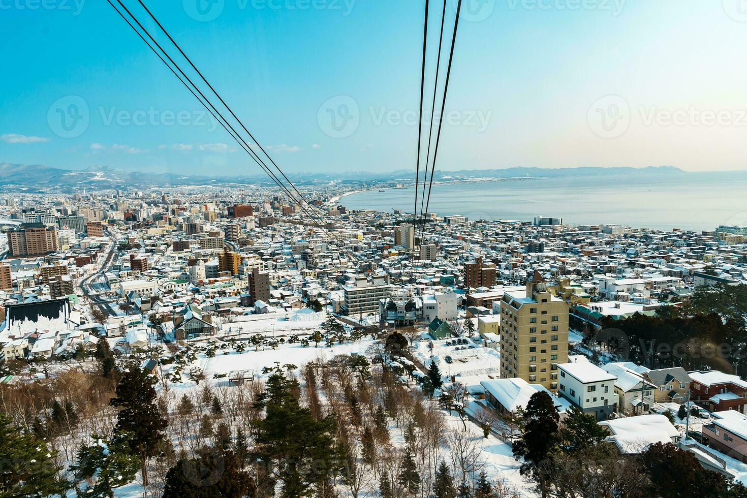 Beautiful landscape and cityscape from Hakodate Mountain with Snow in winter season. landmark and popular for attractions in Hokkaido, Japan.Travel and Vacation concept photo