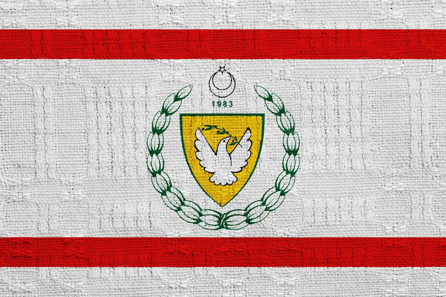 Flag and coat of arms of Turkish Republic of Northern Cyprus on a textured background. Concept collage. photo