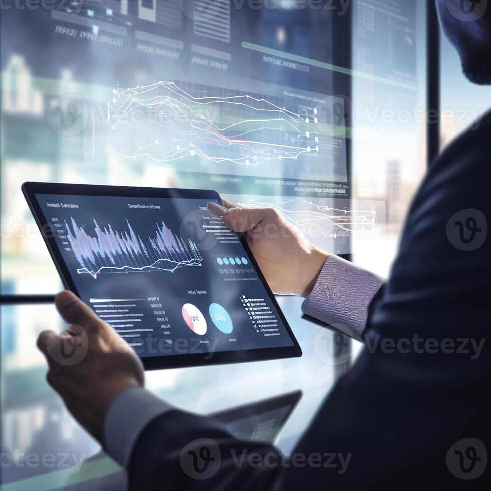 man using tablet with data on screen. photo