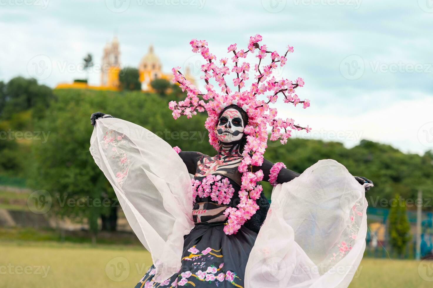 Enchanting Catrina A Dia de los Muertos Photoshoot in Cholula Cempasuchil Fields, Framed by the Iconic Cholula Church, Celebrating Beauty and Tradition photo