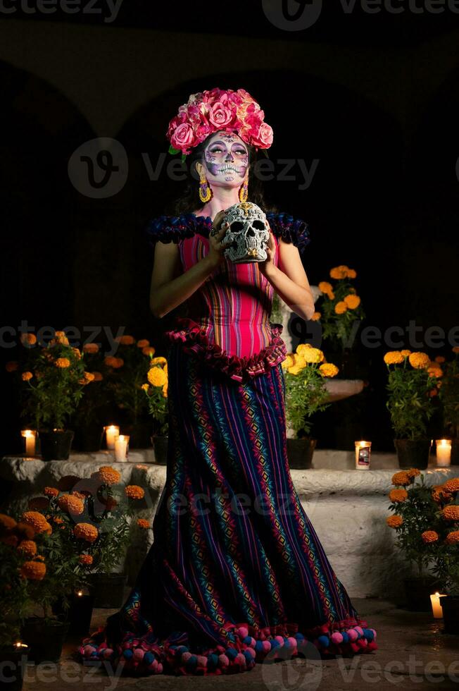 Calavera Catrina sitting on a throne. Sugar skull makeup. Dia de los muertos. Day of The Dead. Halloween. photo