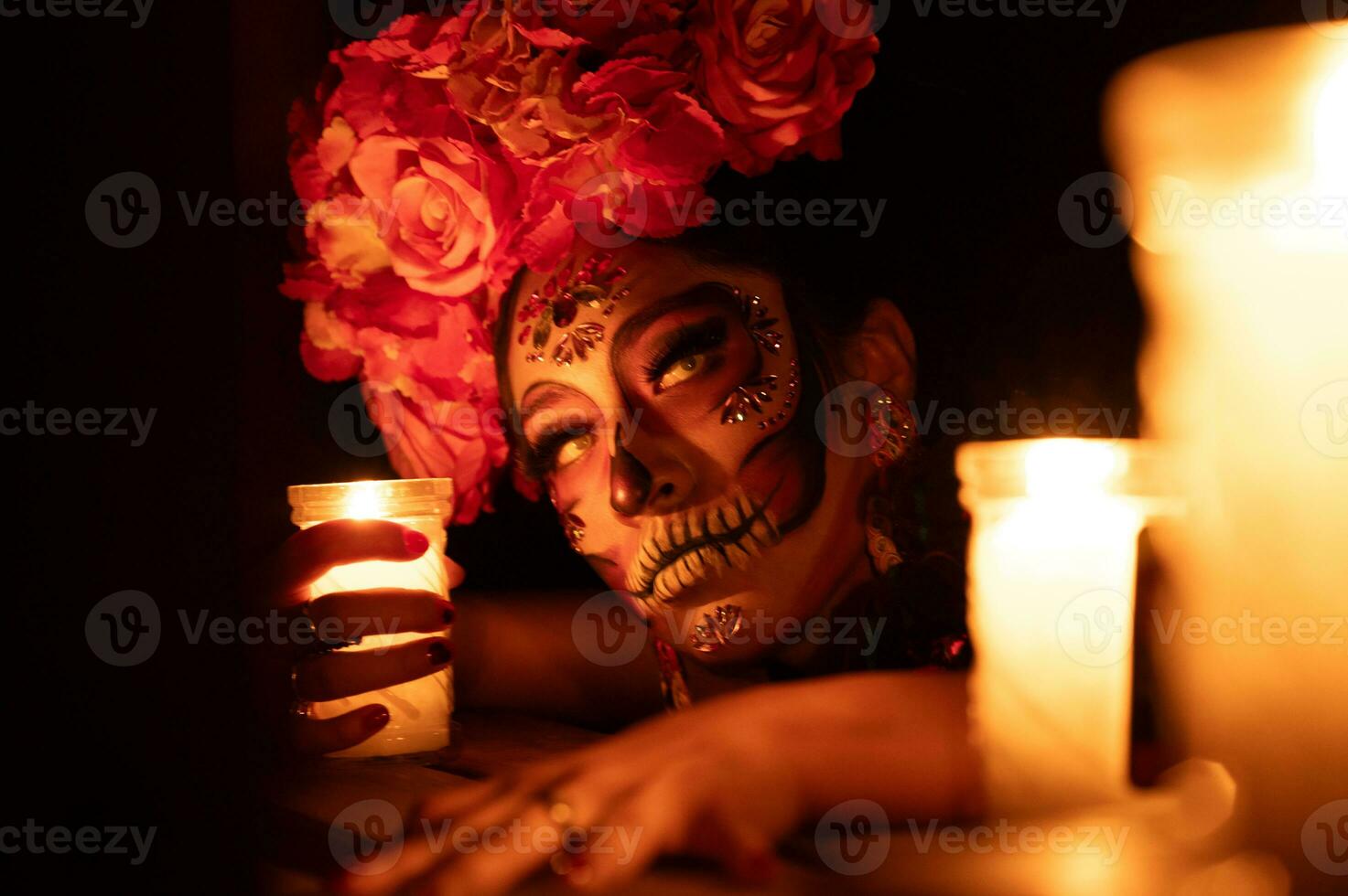 Calavera Catrina sitting on a throne. Sugar skull makeup. Dia de los muertos. Day of The Dead. Halloween. photo