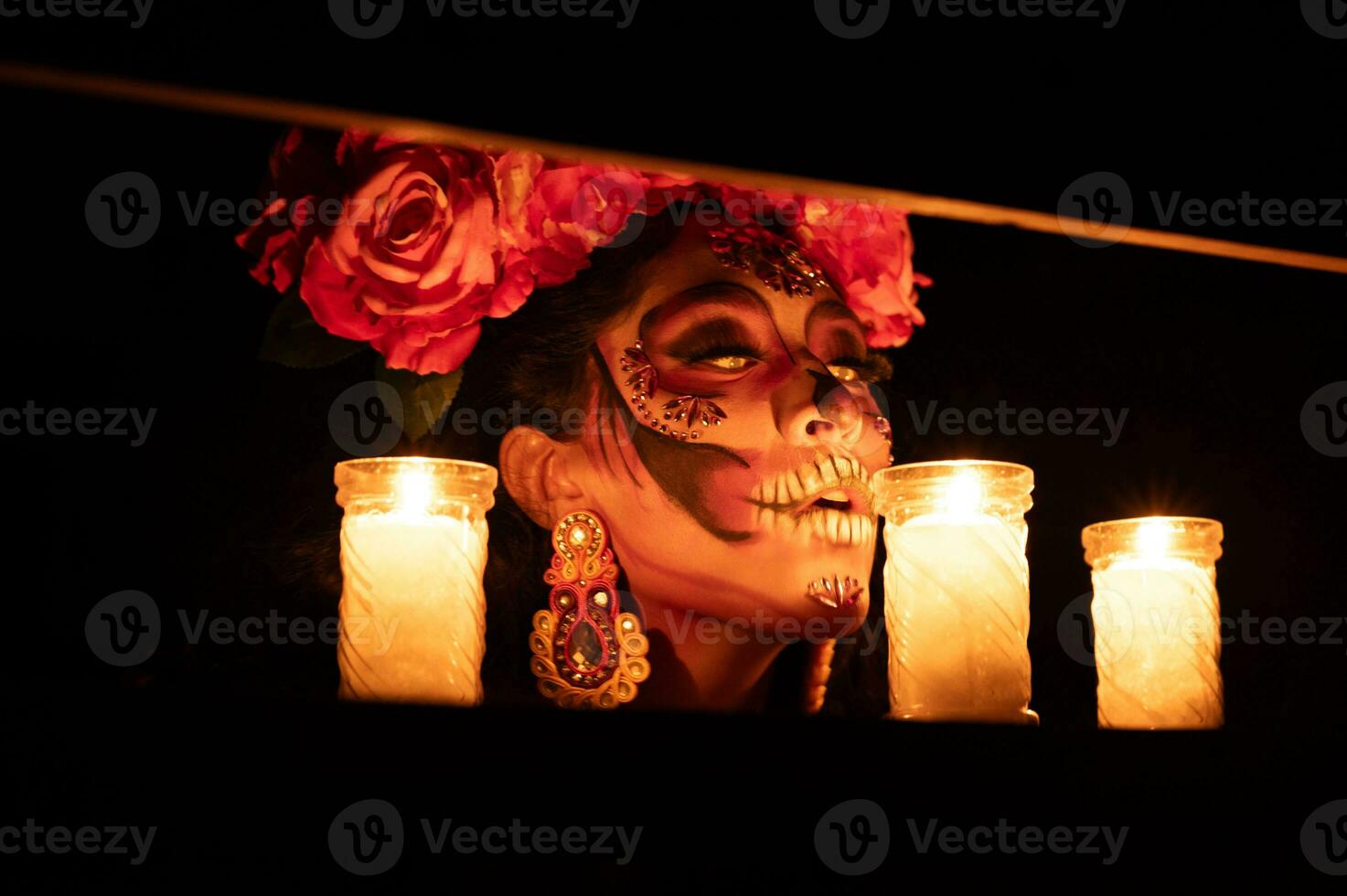 Calavera Catrina sitting on a throne. Sugar skull makeup. Dia de los muertos. Day of The Dead. Halloween. photo