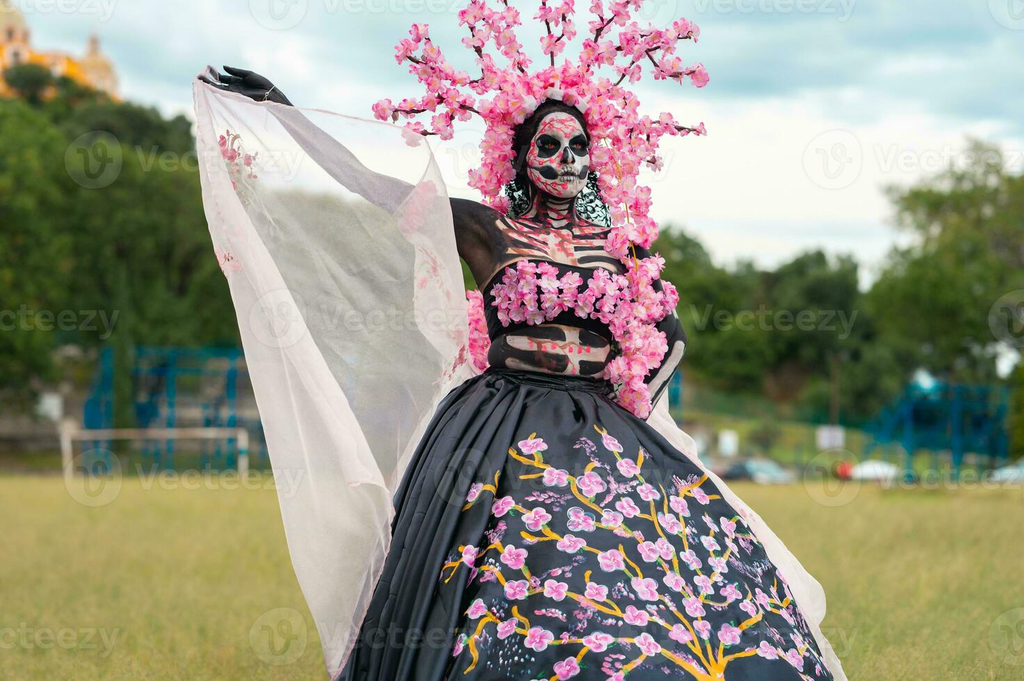Enchanting Catrina A Dia de los Muertos Photoshoot in Cholula Cempasuchil Fields, Framed by the Iconic Cholula Church, Celebrating Beauty and Tradition photo
